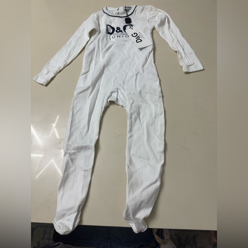 D&G Junior White Kids Footie One Piece has a damage that you can take it out
